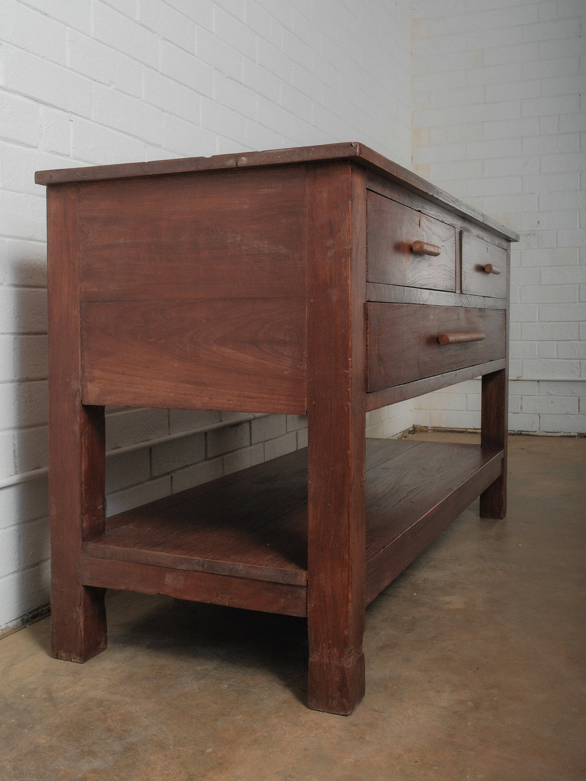 Wooden Three-Drawer Console with Lower Shelf