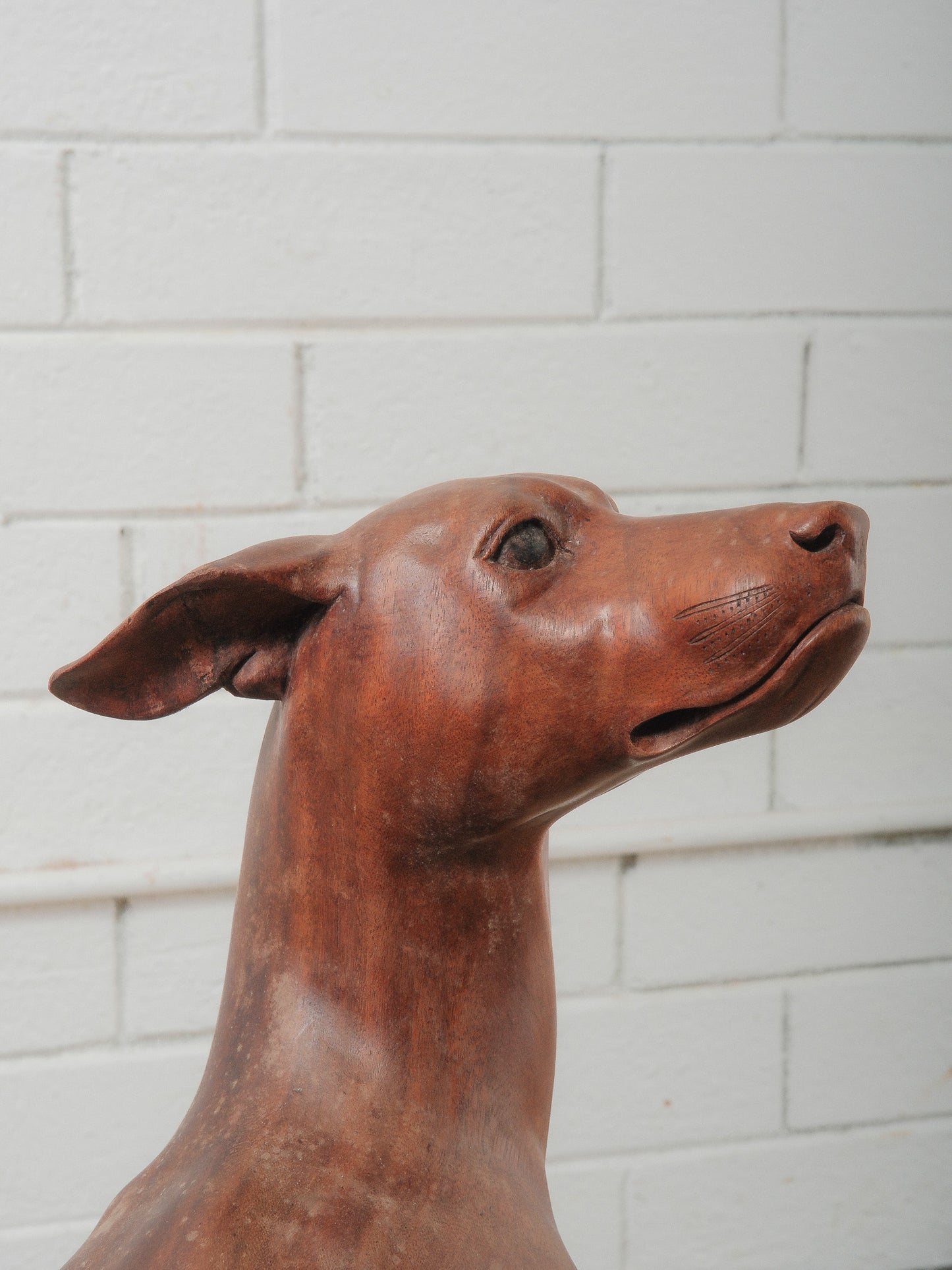 Hand-Carved Wooden Greyhound Sculpture in Expressive Mid-Stride Pose
