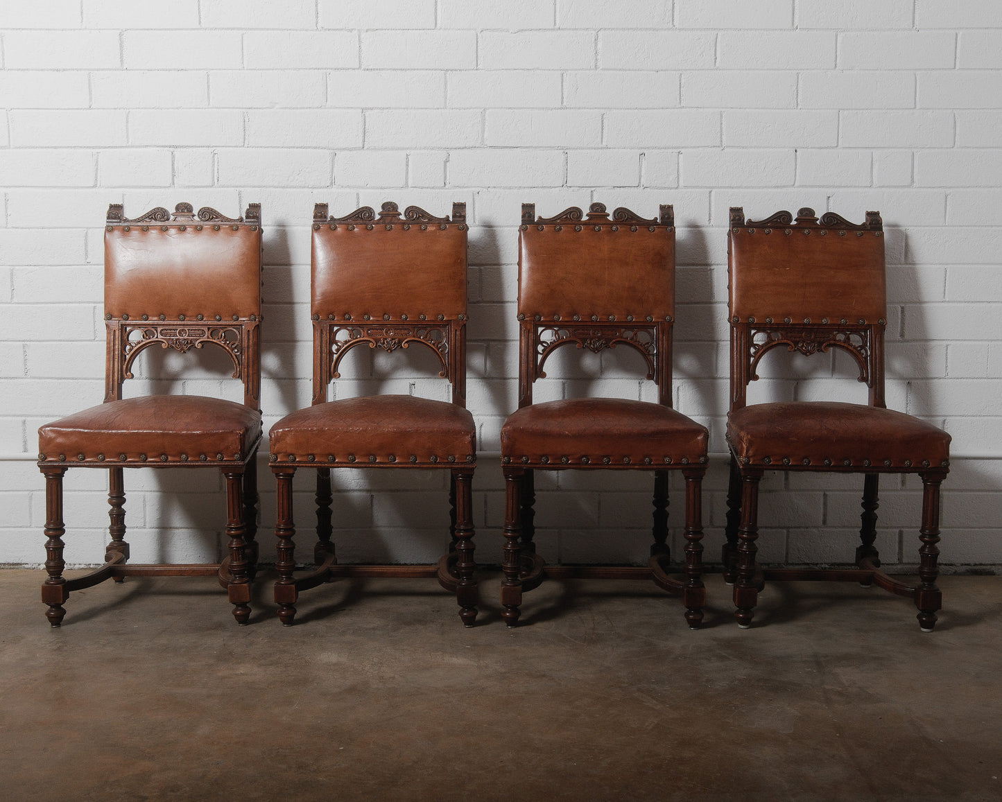 Antique Henry II Renaissance Style Brown Leather and Wood Chairs