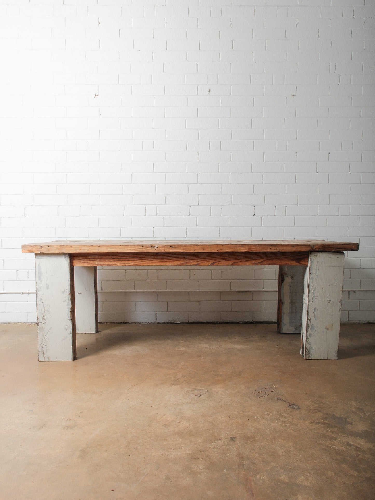 Rustic Farmhouse Dining Table with Natural Wood Slice Inlays and Painted Base