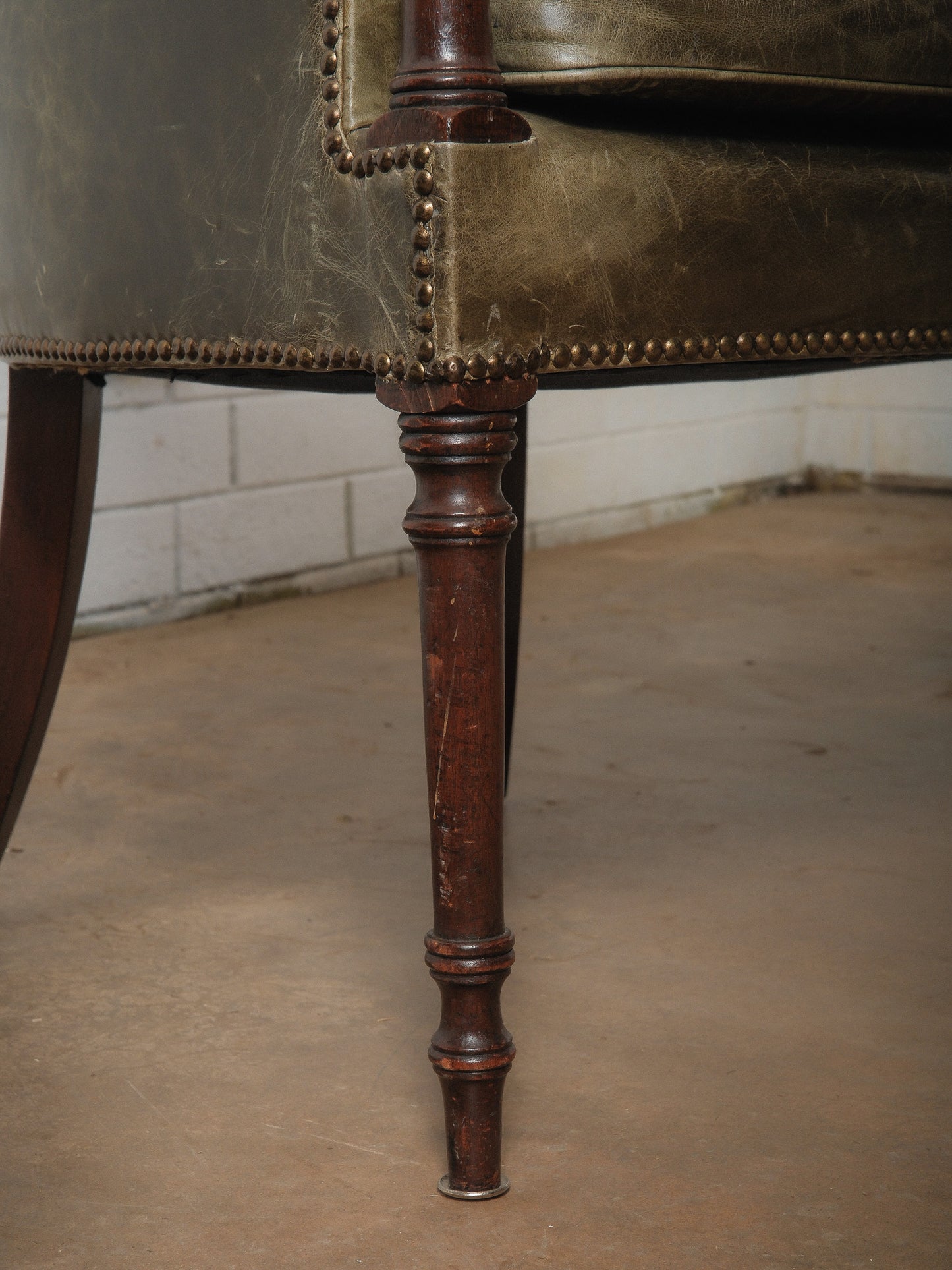 Pair of Vintage Green Leather Barrel Chairs with Turned Wood Legs and Nailhead Trim