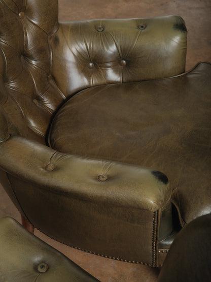 Pair of Vintage Tufted Leather Club Chairs with Brass Casters and Turned Legs