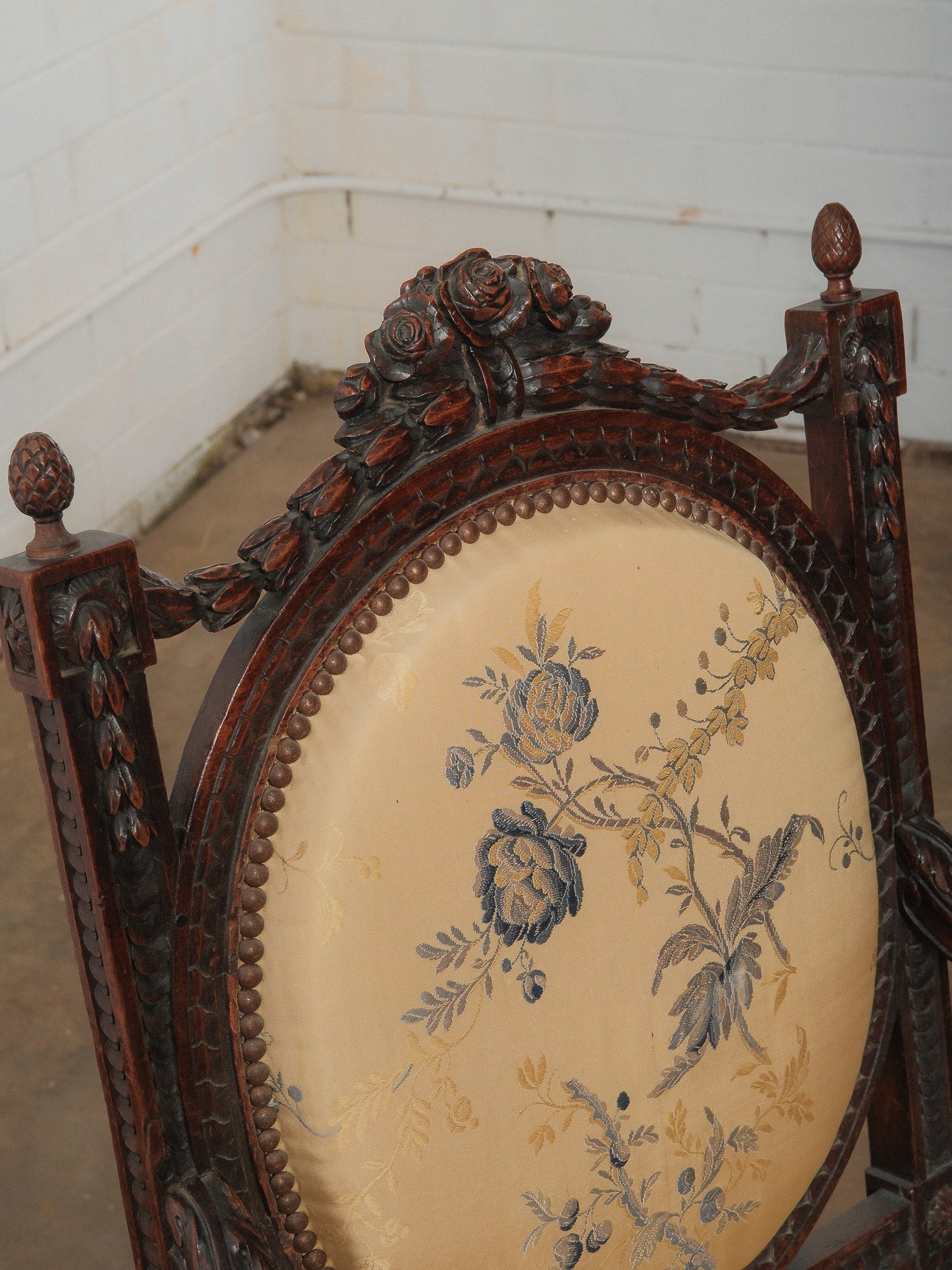 Pair of Antique Louis XVI Style Carved Armchairs with Floral Upholstery