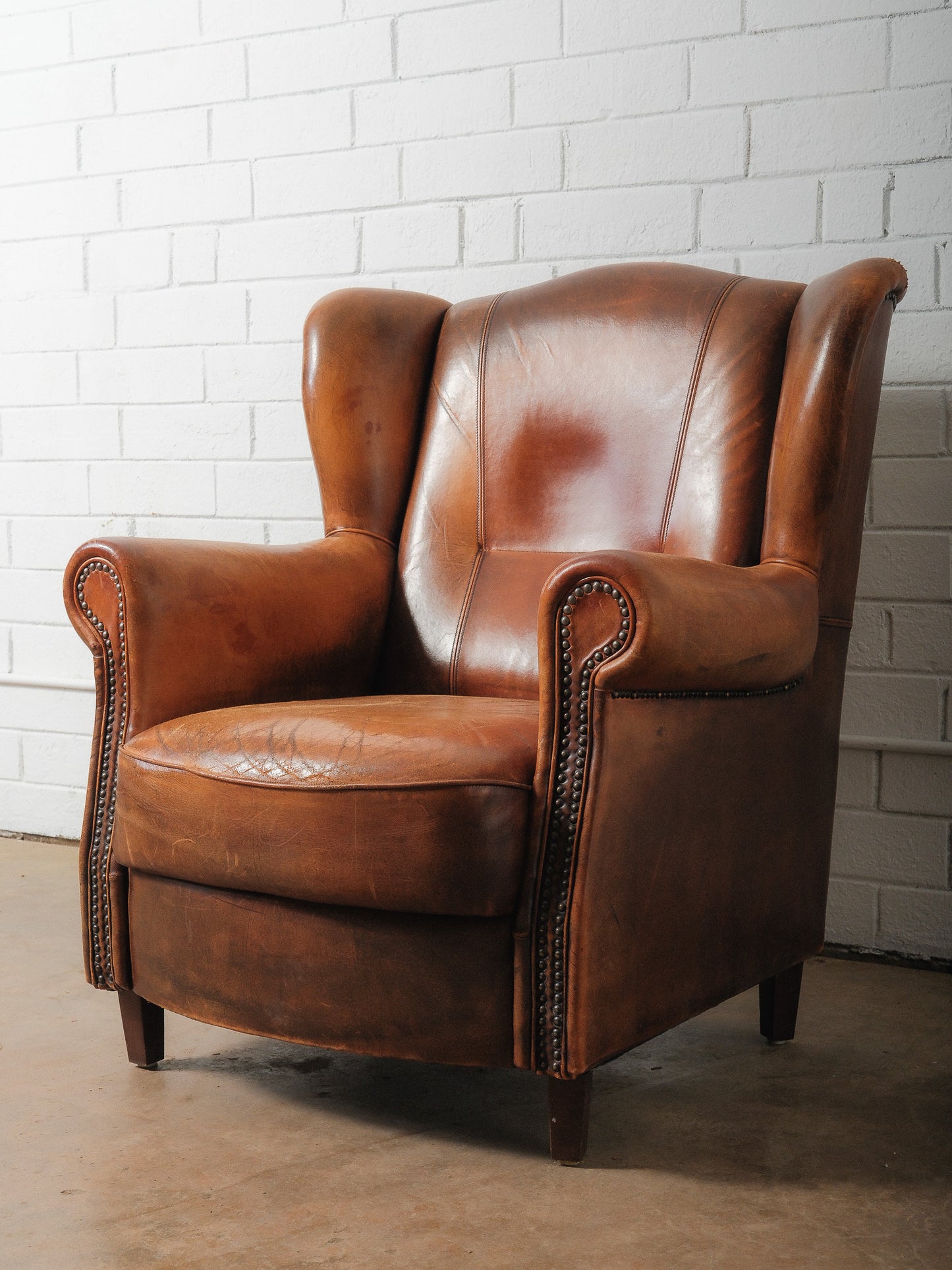 Antique French Leather Wingback Club Chair with Nailhead Trim