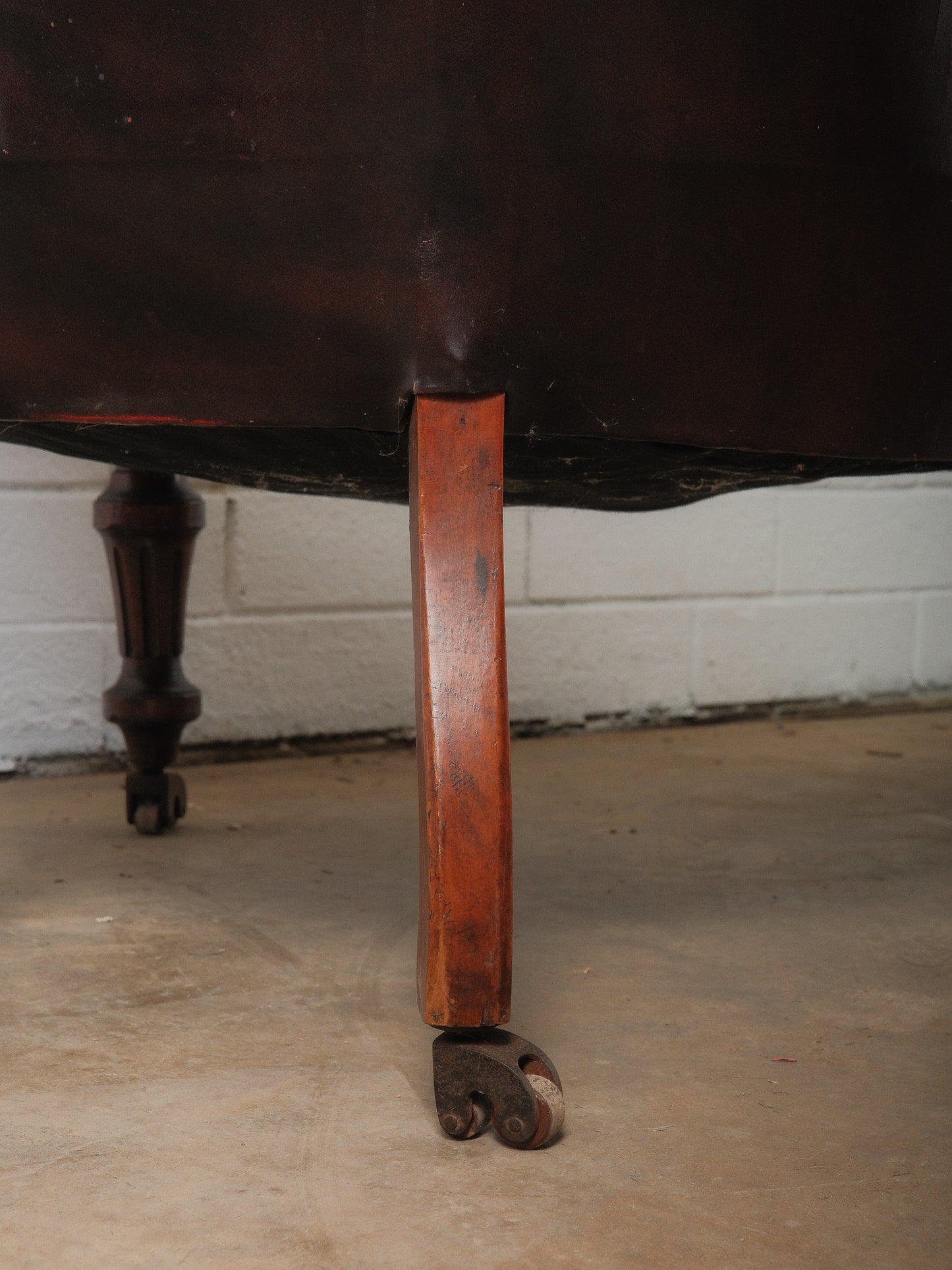 Antique Victorian Tufted Leather Armchair on Casters