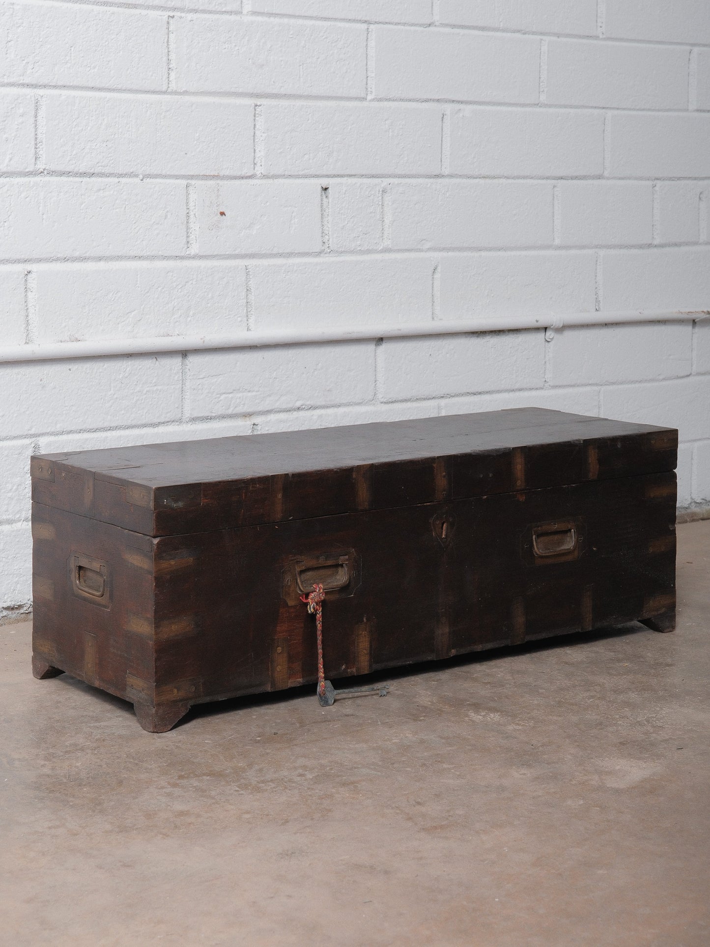 Rustic Dark Wood Storage Chest with Brass Plate Joinery and Key