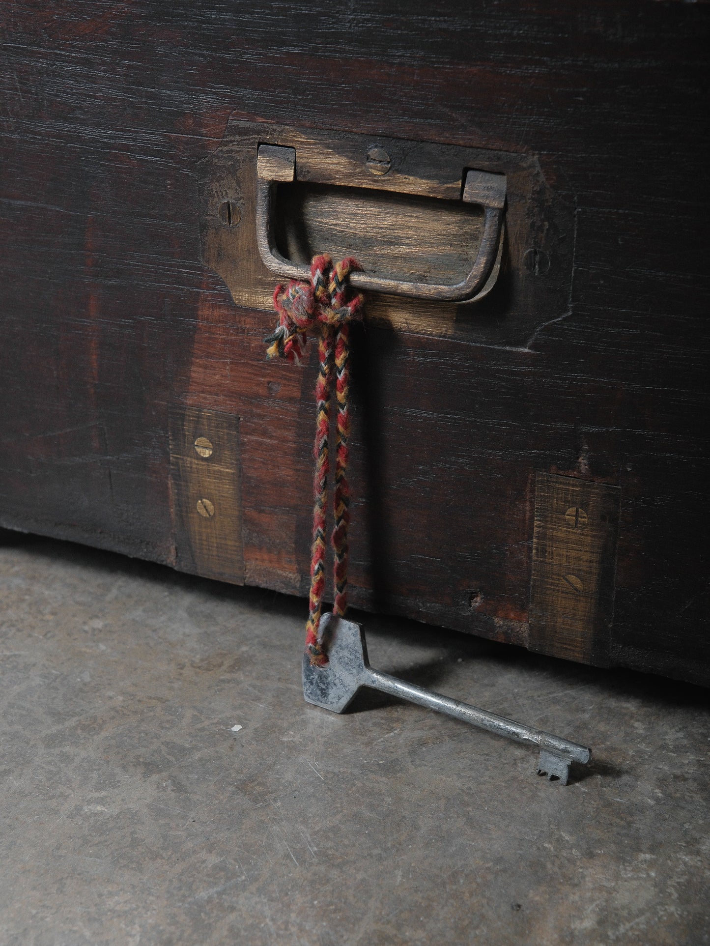 Rustic Dark Wood Storage Chest with Brass Plate Joinery and Key