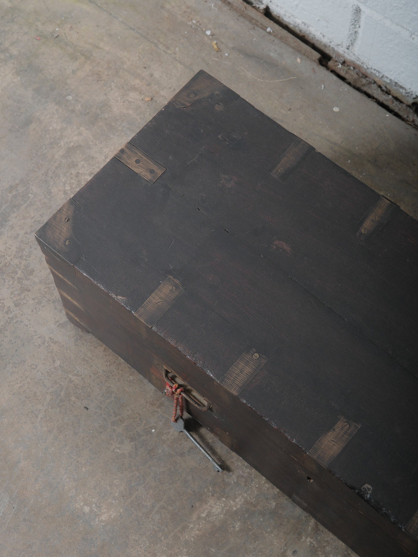 Rustic Dark Wood Storage Chest with Brass Plate Joinery and Key