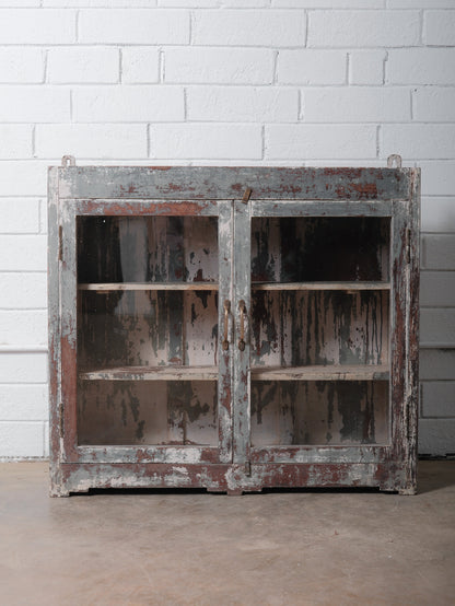 Rustic Glass-Front Cabinet With Distressed Paint