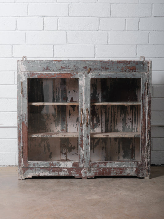 Rustic Glass-Front Cabinet With Distressed Paint