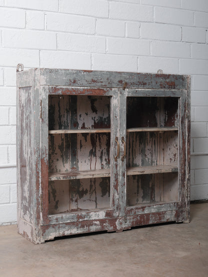 Rustic Glass-Front Cabinet With Distressed Paint