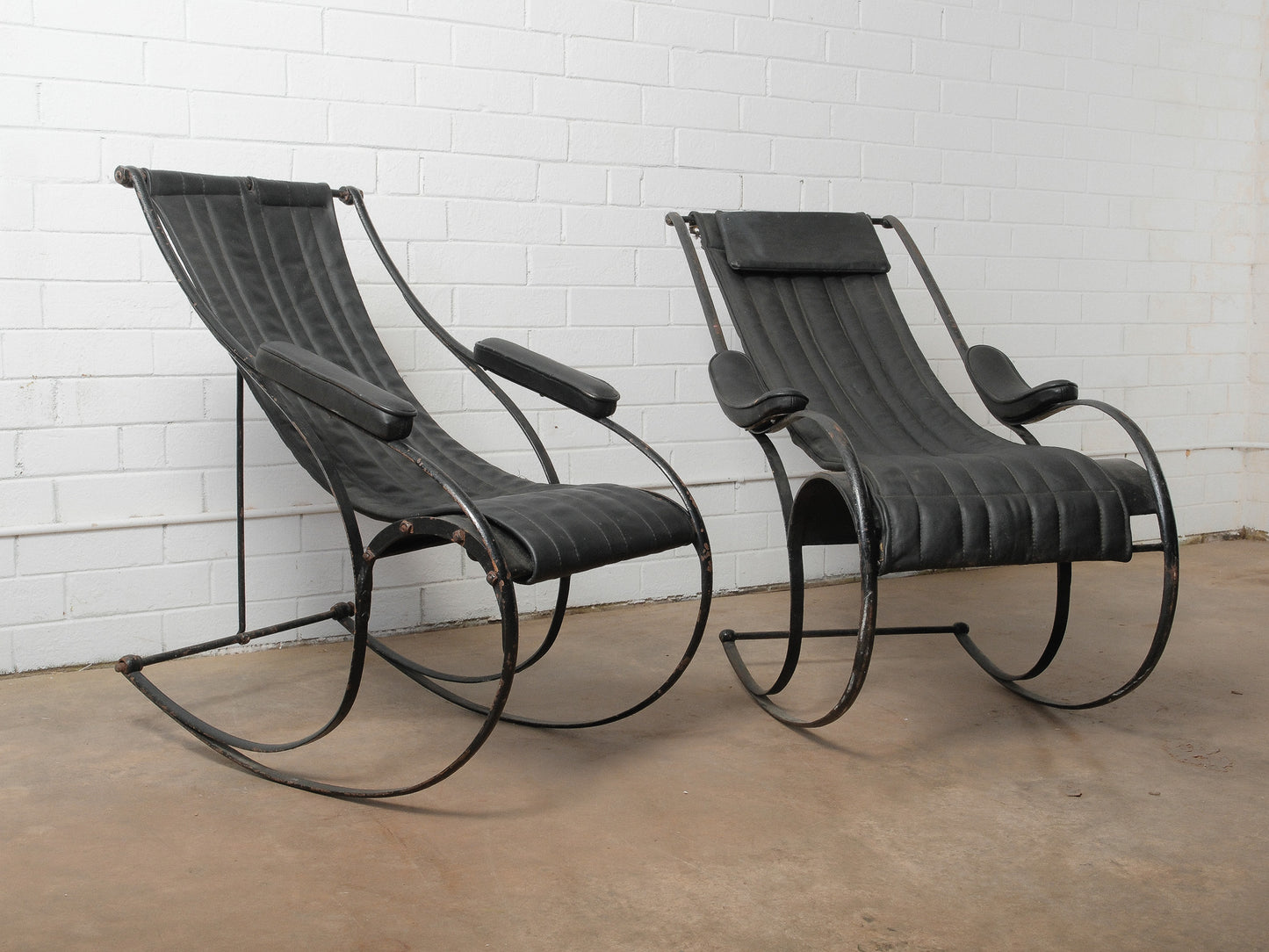 Pair of Circa 1850 Peter Cooper Rocking Chairs for R.W. Winfield in Black Leather and Iron