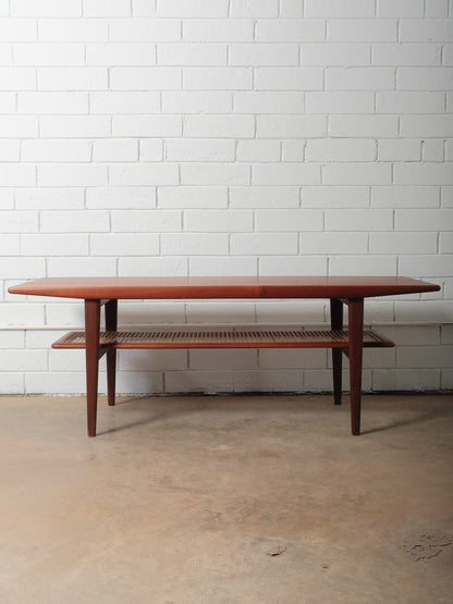 Danish Teak Coffee Table with Cane Shelf by Niels Bach, 1960s
