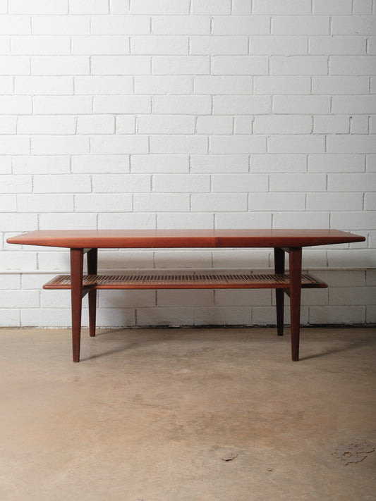 Danish Teak Coffee Table with Cane Shelf by Niels Bach, 1960s
