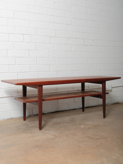 Danish Teak Coffee Table with Cane Shelf by Niels Bach, 1960s