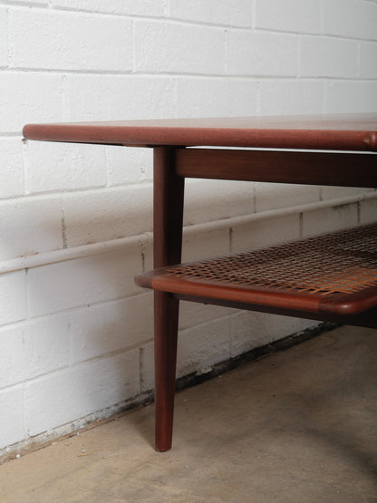 Danish Teak Coffee Table with Cane Shelf by Niels Bach, 1960s