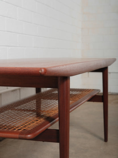 Danish Teak Coffee Table with Cane Shelf by Niels Bach, 1960s