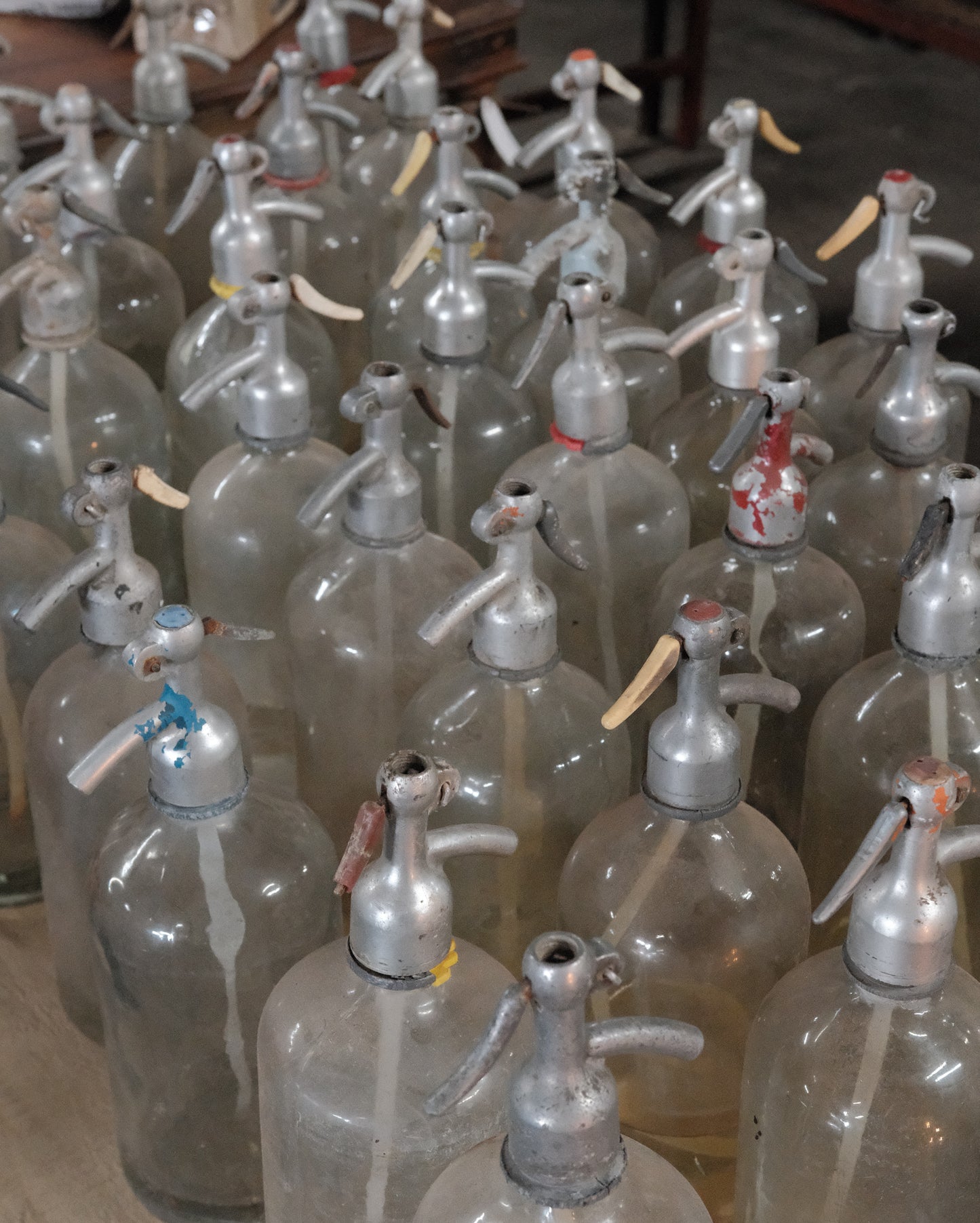 Vintage Soda Siphon Bottles in Wooden Crate
