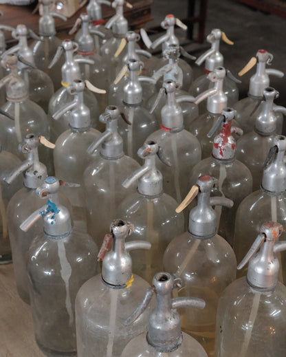 Vintage Soda Siphon Bottles in Wooden Crate