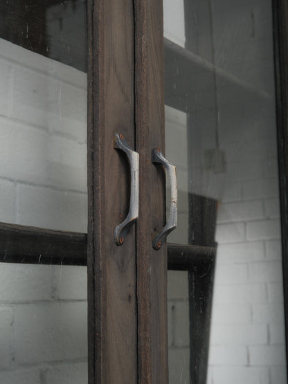 Dark Wood Glass-Front Cabinet on Tiered Open Base