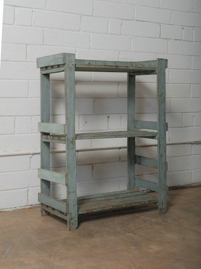 Weathered Blue Wooden Shelf with Open Framework