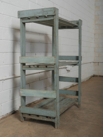 Weathered Blue Wooden Shelf with Open Framework