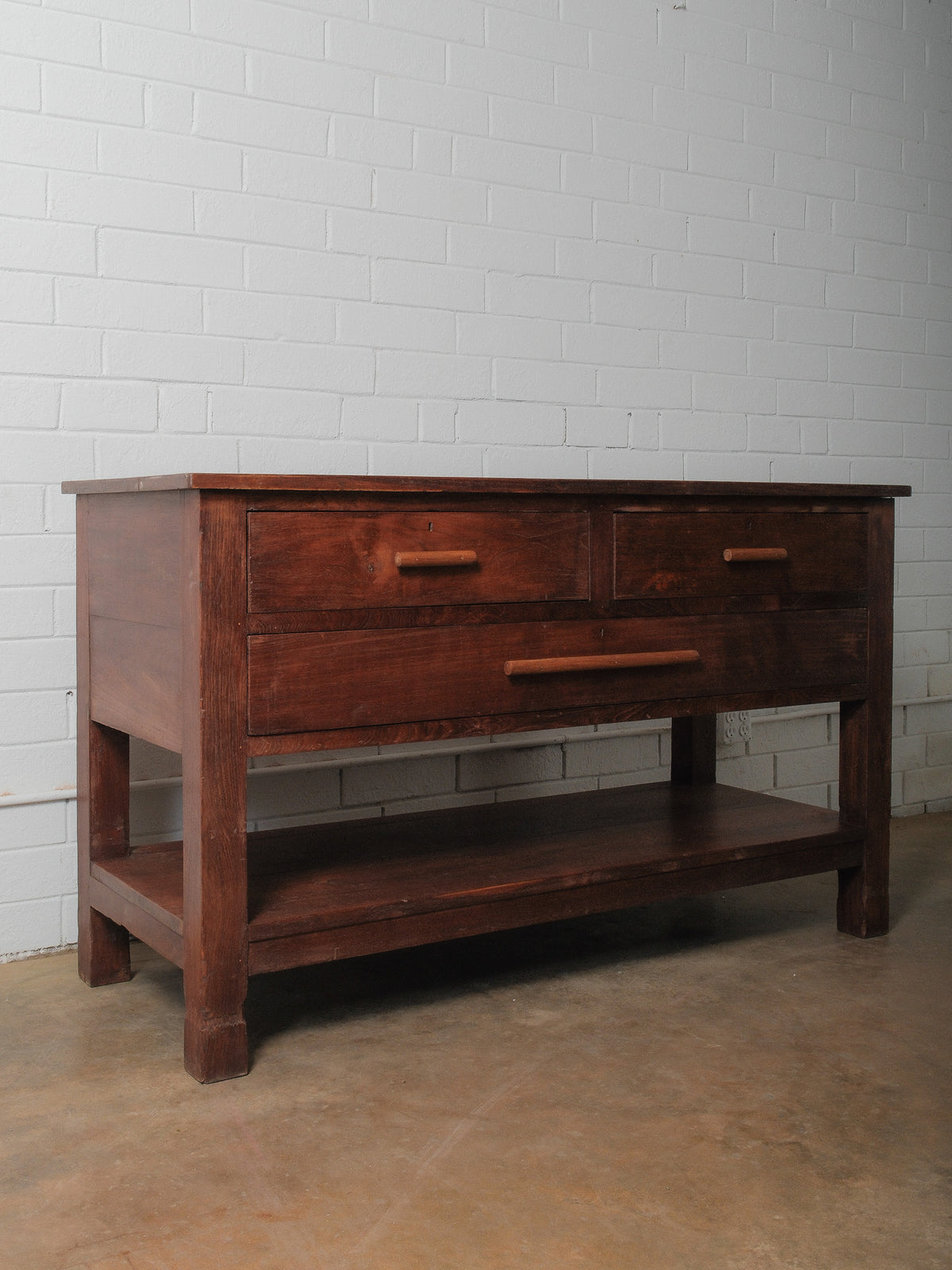 Wooden Three-Drawer Console with Lower Shelf