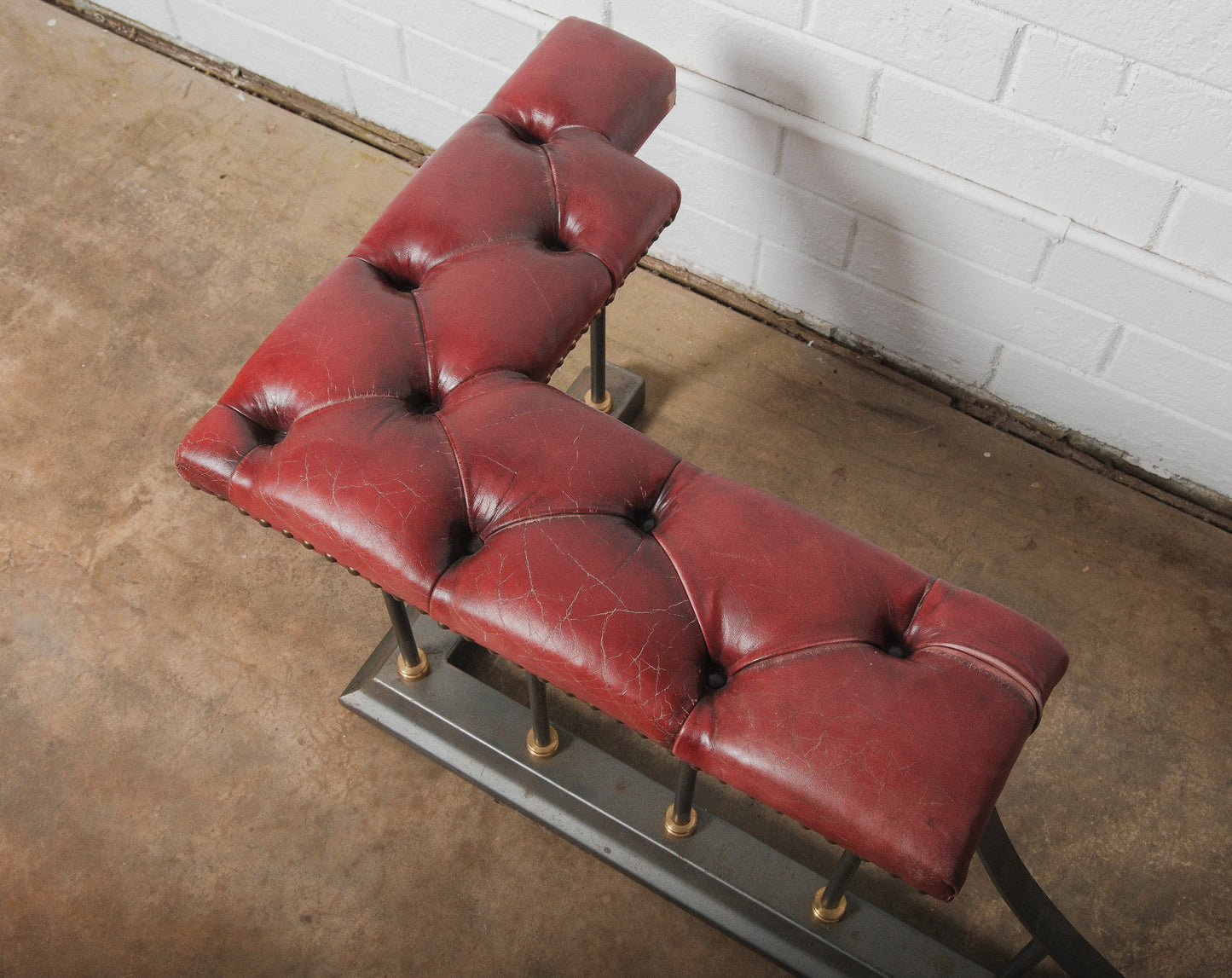 Chesterfield Leather and Iron Fireplace Club Fender with Tufted Burgundy Seating