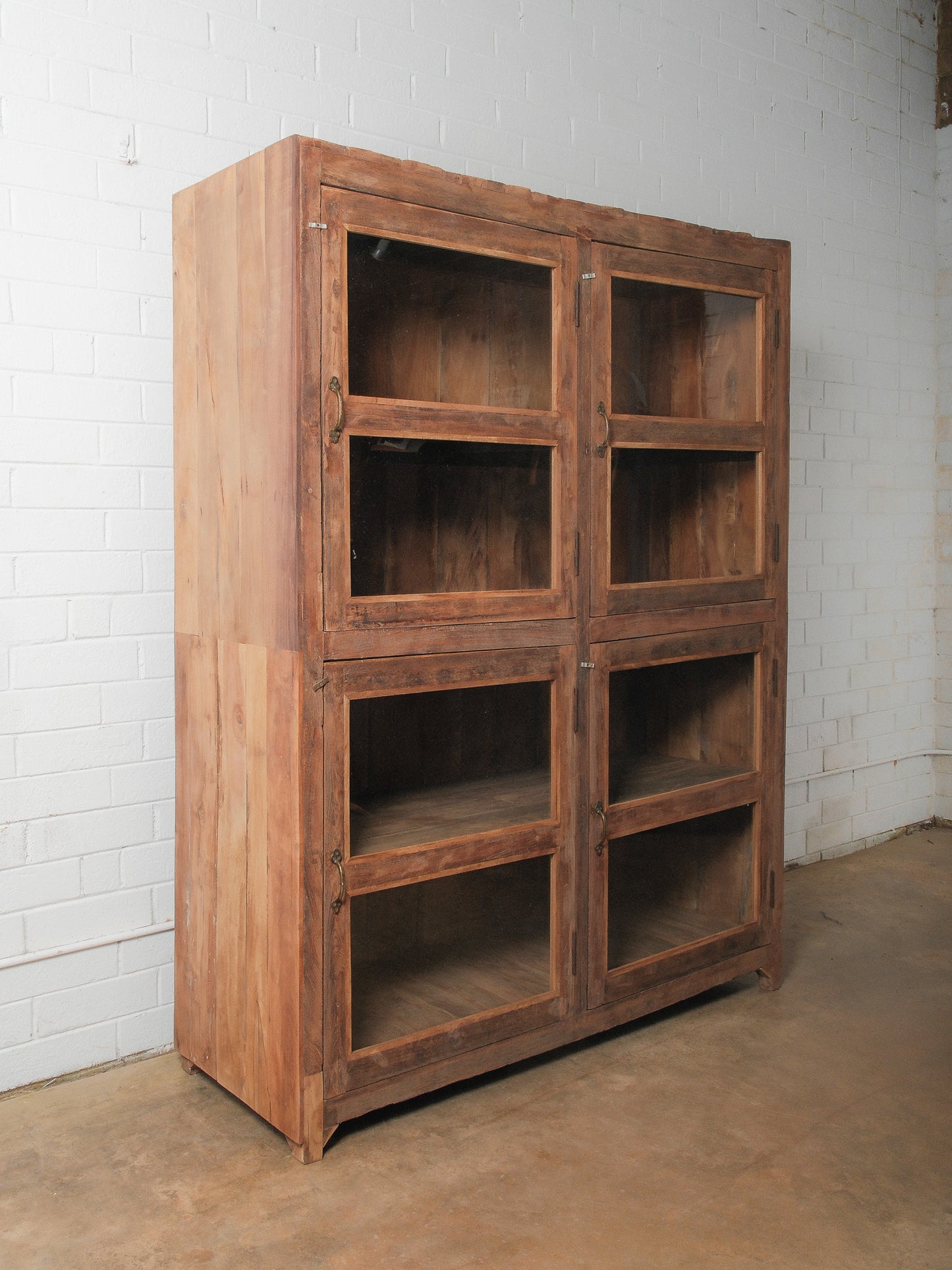 Wood and Glass Four-Door Display Cabinet with Patinated Finish