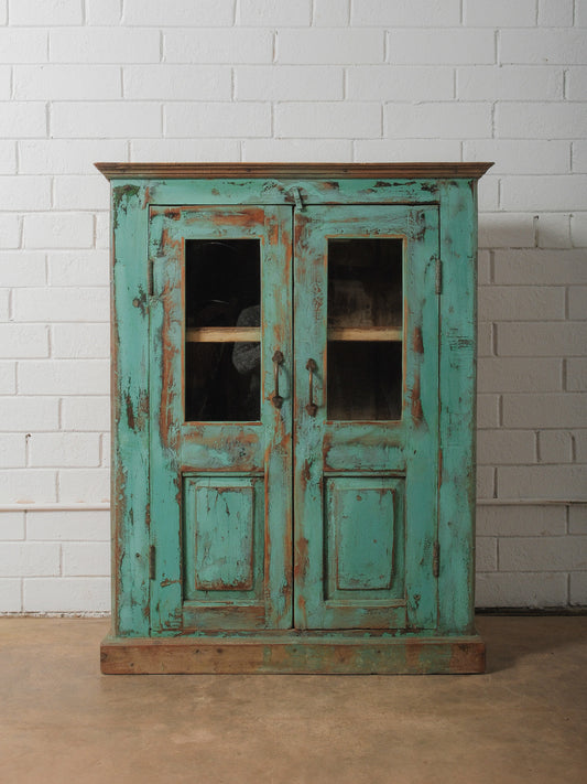 Weathered Green Painted Wood Cabinet with Glazed Doors and Brass Hardware