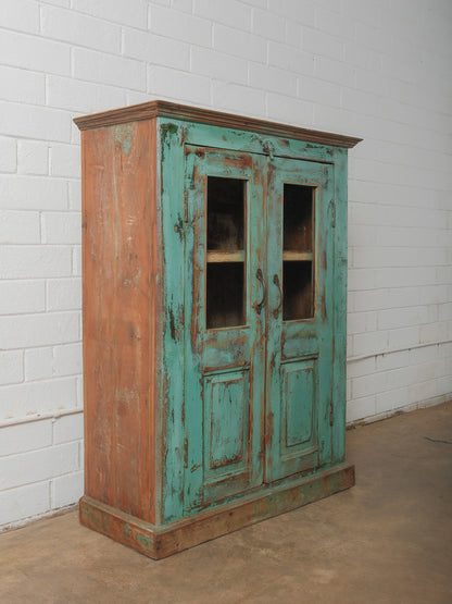 Weathered Green Painted Wood Cabinet with Glazed Doors and Brass Hardware