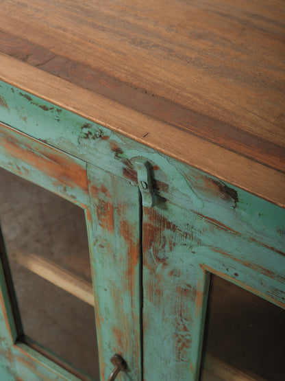 Weathered Green Painted Wood Cabinet with Glazed Doors and Brass Hardware