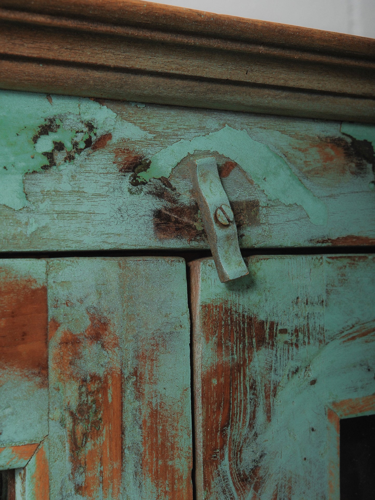 Weathered Green Painted Wood Cabinet with Glazed Doors and Brass Hardware