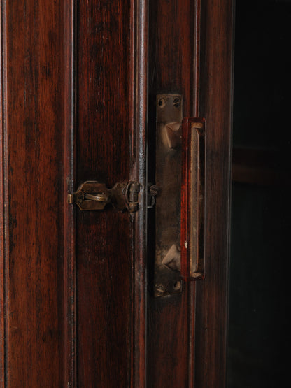 Large Two-Part Wooden Glass-Front Cabinet with Paneled Base and Carved Detail