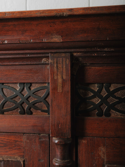 Large Two-Part Wooden Glass-Front Cabinet with Paneled Base and Carved Detail