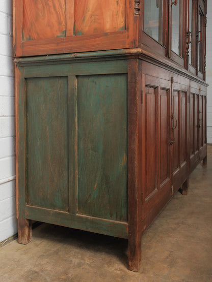Large Two-Part Wooden Glass-Front Cabinet with Paneled Base and Carved Detail