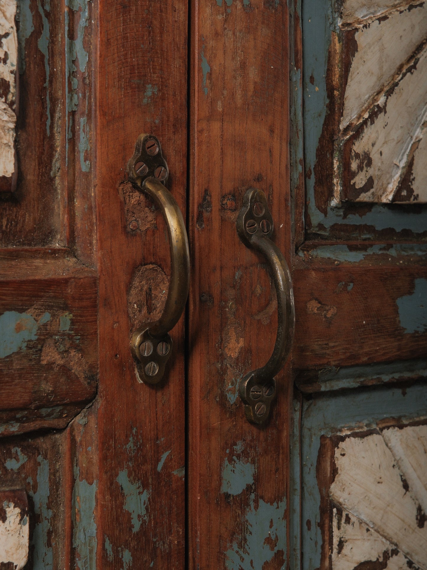 Hand-Carved Indian Wooden Cabinet with Sunburst Panels and Original Blue Paint