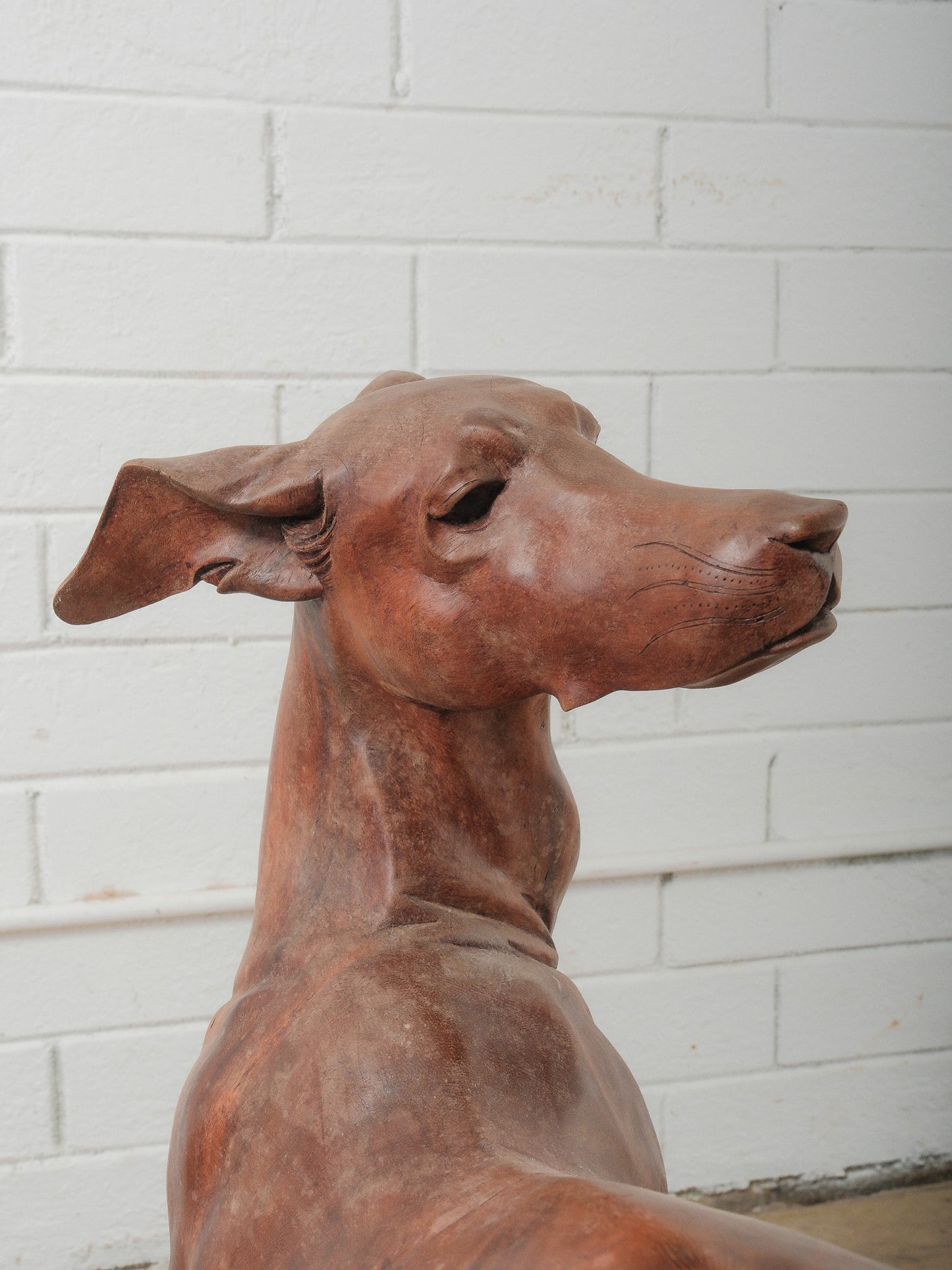 Hand-Carved Wooden Dog Sculpture in Dynamic Running Pose