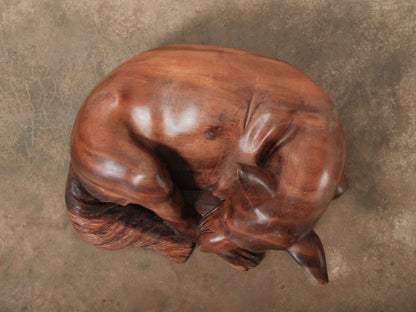 Hand-Carved Wooden Sleeping Dog Sculpture in Curled Resting Pose