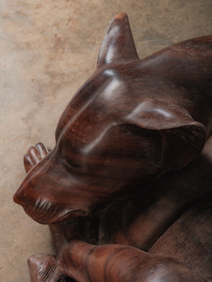 Hand-Carved Wooden Sleeping Dog Sculpture in Curled Resting Form