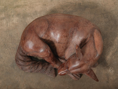 Hand-Carved Wooden Sleeping Dog Sculpture in Curled Form