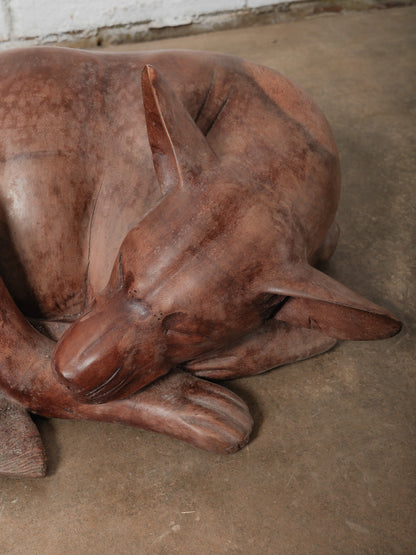 Hand-Carved Wooden Sleeping Dog Sculpture in Curled Form