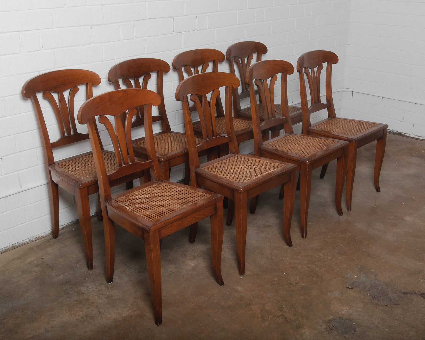 Set of Eight Vintage Wooden Dining Chairs with Curved Backs and Woven Cane Seats