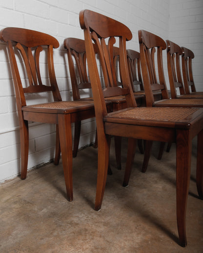 Set of Eight Vintage Wooden Dining Chairs with Curved Backs and Woven Cane Seats