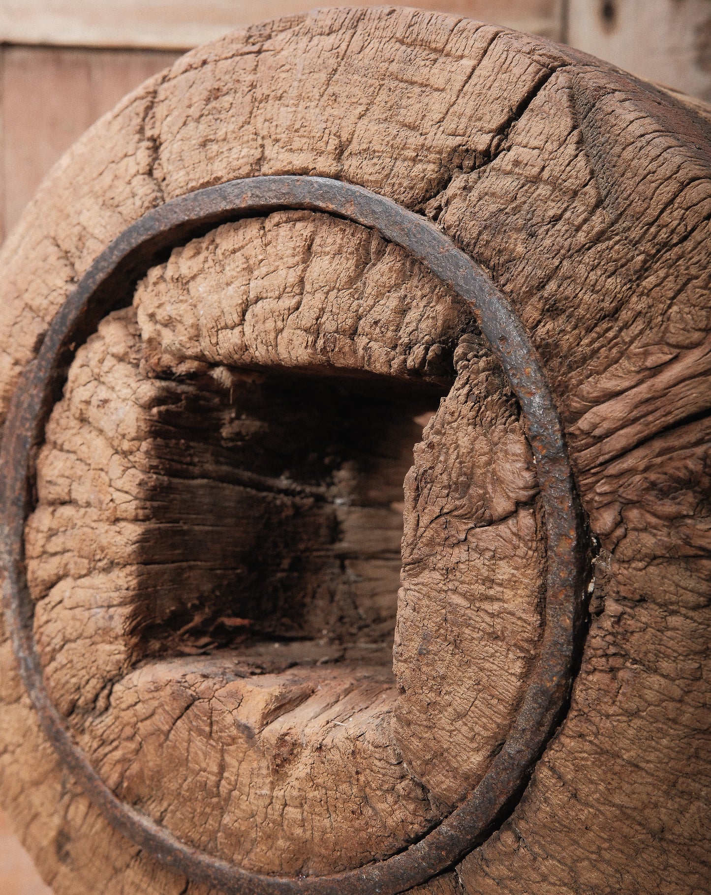 Primitive Wooden Wheel Ring on Iron Stand