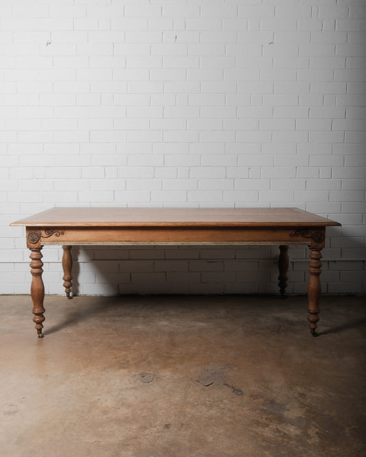 19th Century French Provincial Oak Dining Table with Carved Details and Casters