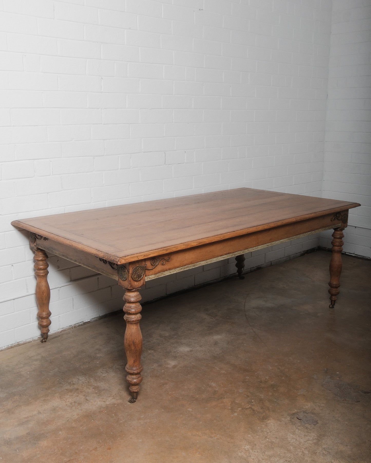 19th Century French Provincial Oak Dining Table with Carved Details and Casters