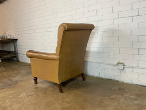 Tan Leather Armchair with Rivet Accents