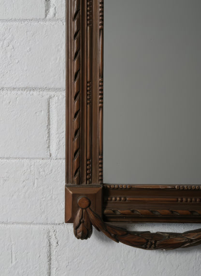 Carved Wood Mirror with Classical Urn Crest and Applied Metal Ornamentation