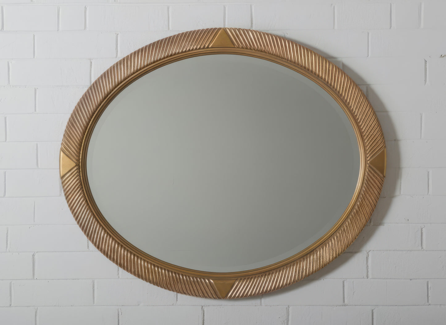 Oval Carved Wood Mirror with Fluted Gilt Frame